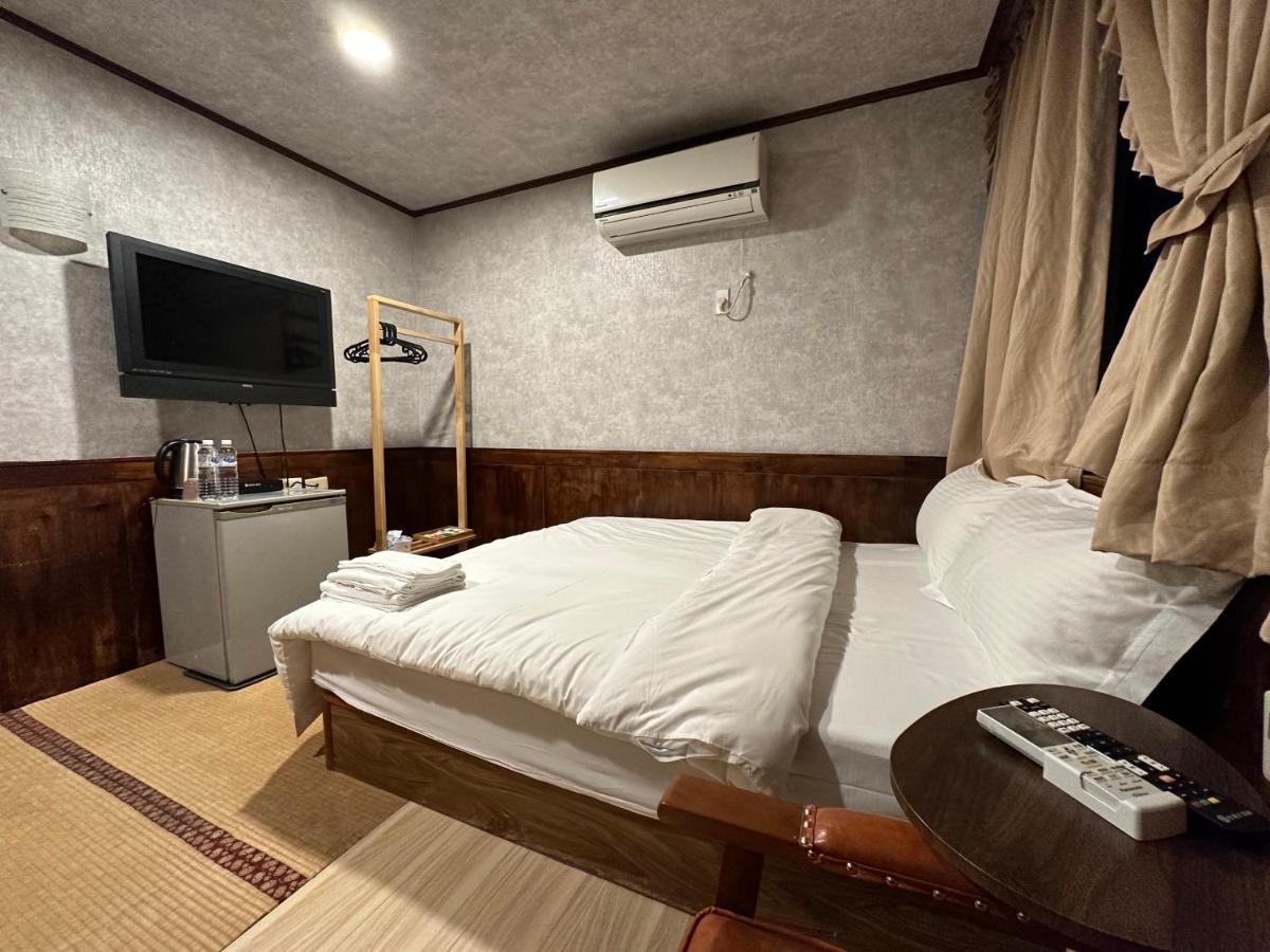 Ming Ren Hotspring Hotel Jiaoxi Bagian luar foto